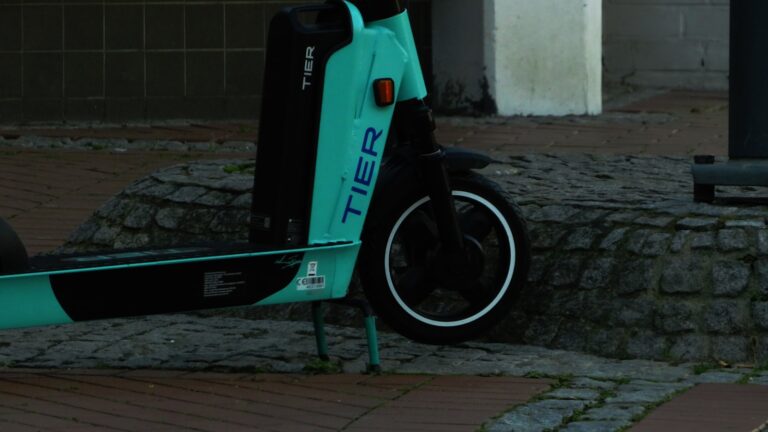 a scooter parked on the side of the road