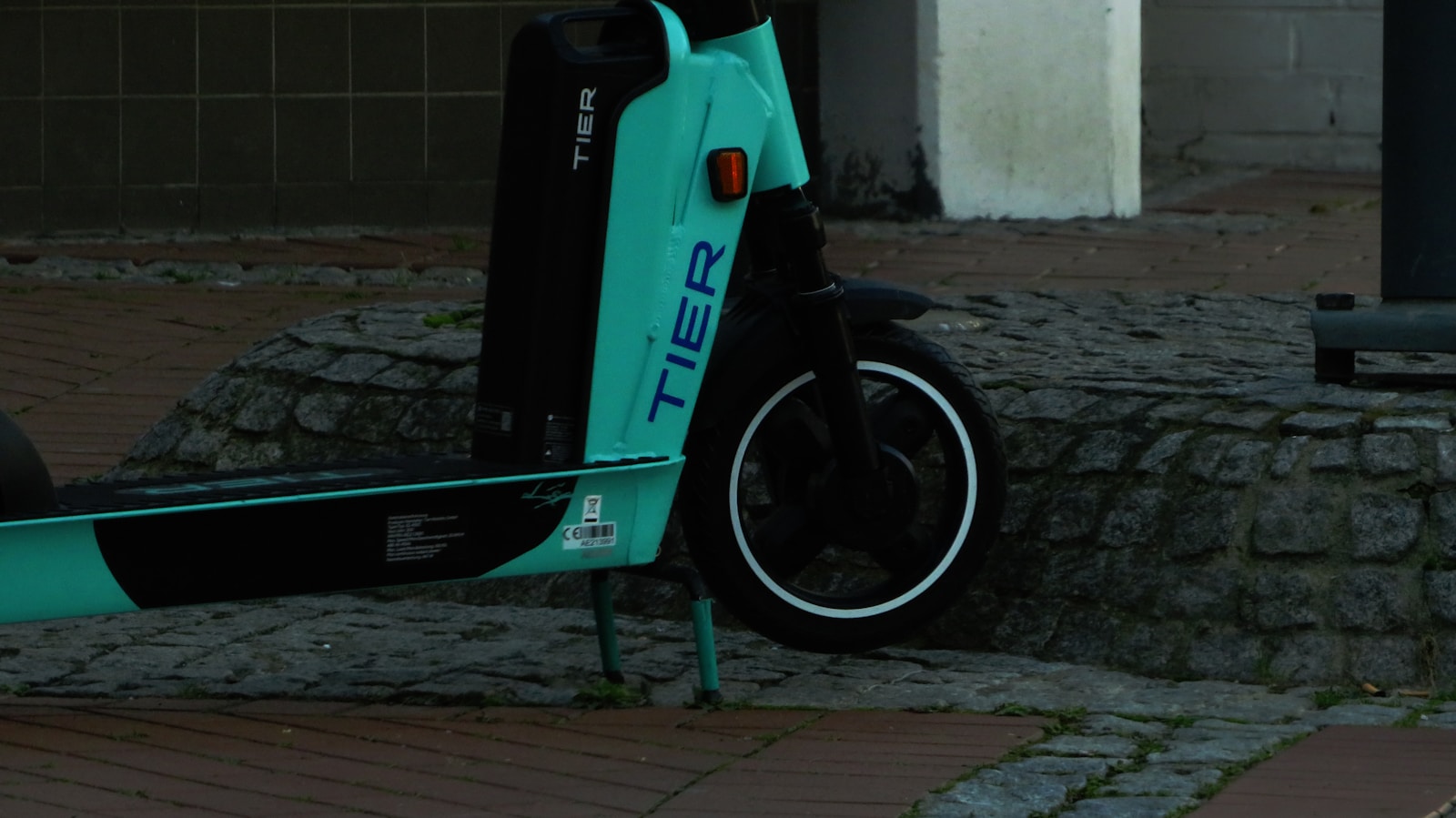 a scooter parked on the side of the road